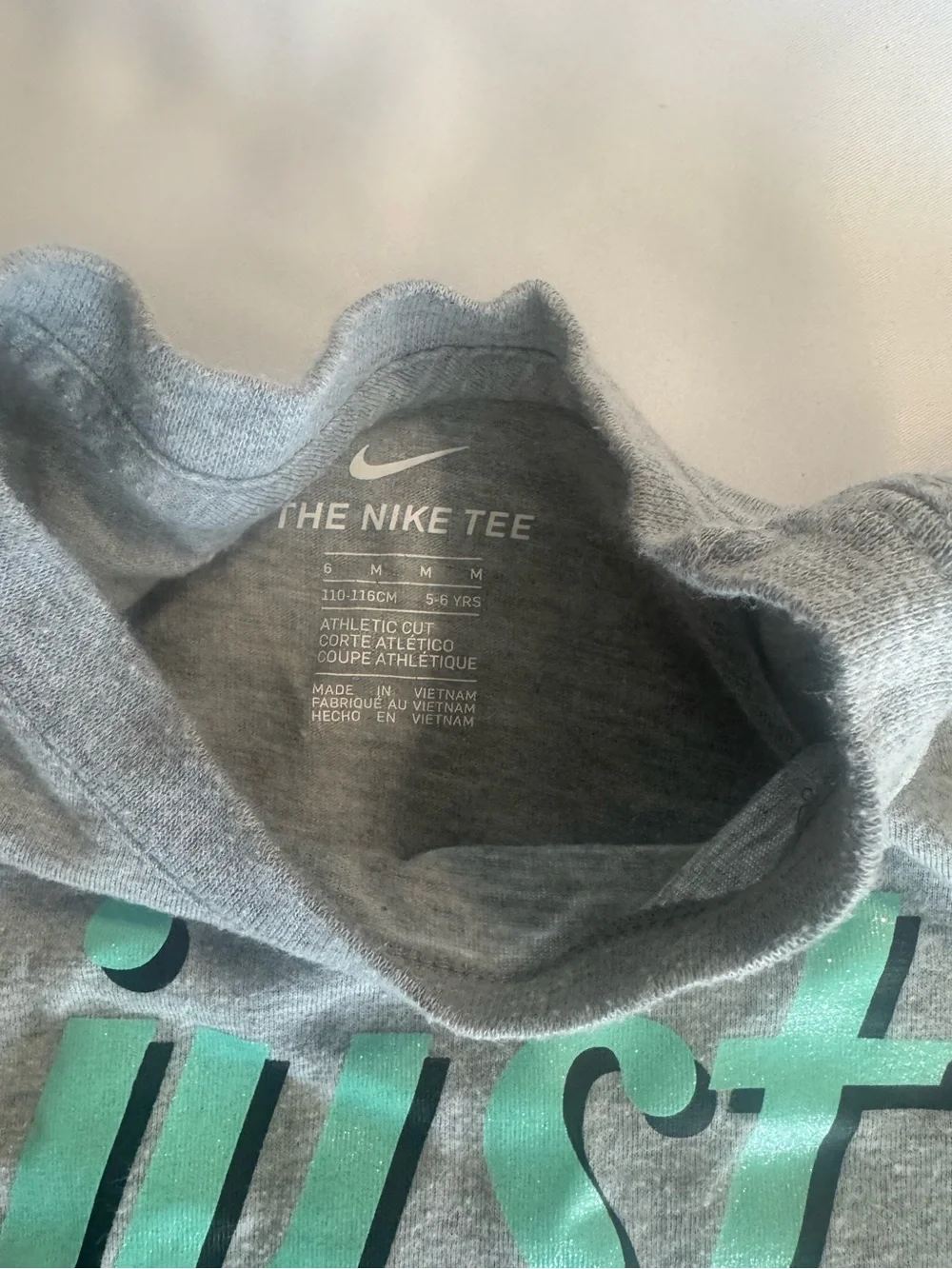 Nike Kids Gray Short Sleeve Tee with Teal & Magenta 'Just Do It' Graphic
